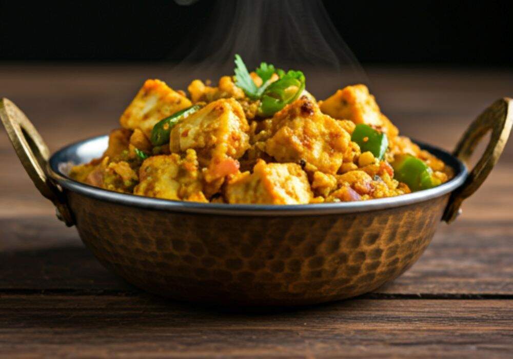 Paneer Bhurji Recipe: A plate of Paneer Bhurji, a flavorful Indian dish made with crumbled paneer, onions, tomatoes, and spice