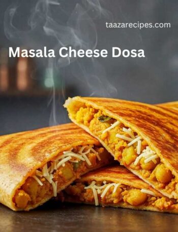 Two folded Masala Cheese Dosa, cut in half, revealing a filling of spiced potatoes and shredded cheese. Steam rises from the dosas, indicating they are hot. The dosas have a golden-brown, crispy texture with visible grill marks.