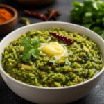 Palak Khichdi Recipe: A bowl of Palak Khichdi, a comforting Indian dish made with spinach, rice, and lentils.