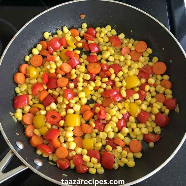 Chilli Milli Recipe: Throw in carrots, bell peppers, and corn